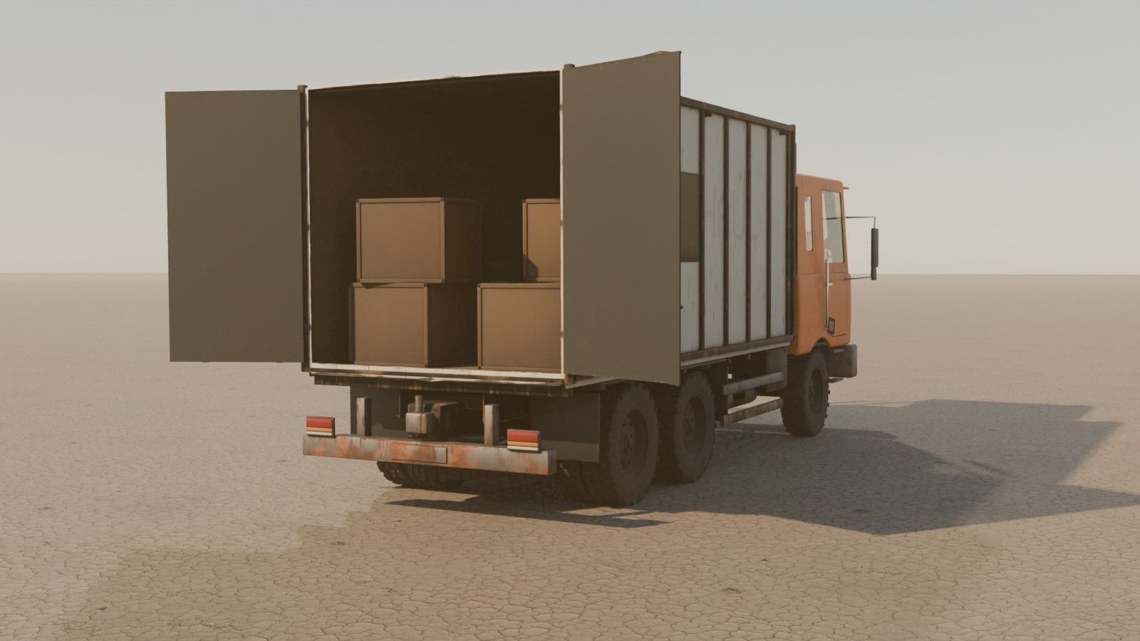 A cargo truck with its box doors open and crates inside